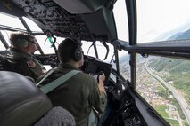 Crew members from the 36th Airlift Squadron conduct low-level maneuvers