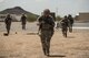 Senior Airman Devon Vorse, 56th CES EOD team member, leads the rest of his team to the next training scenario during a fly-away training mission July, 21, 2017, at the Florence Military Training Reservation in Florence, Ariz. Throughout the day, teams used communication and teamwork to tackle rigorous contingency scenarios. (U.S. Air Force Photo/ Airman 1st Class Alexander Cook)