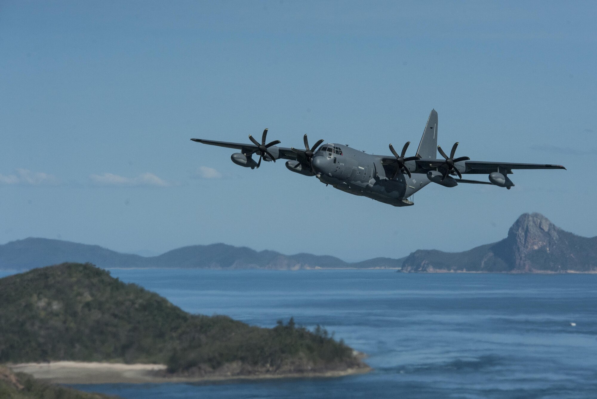A U.S. Air Force 17th Special Operations Squadron MC-130J Commando II flies in dissimilar formation with a No. 37 Squadron Royal Australian Air Force C-130J Hercules July 19, 2017, over Queensland, Australia. The bilateral training events performed during Talisman Saber 2017 enable greater interoperability between the U.S. and Australian militaries. (U.S. Air Force photo by Capt. Jessica Tait)