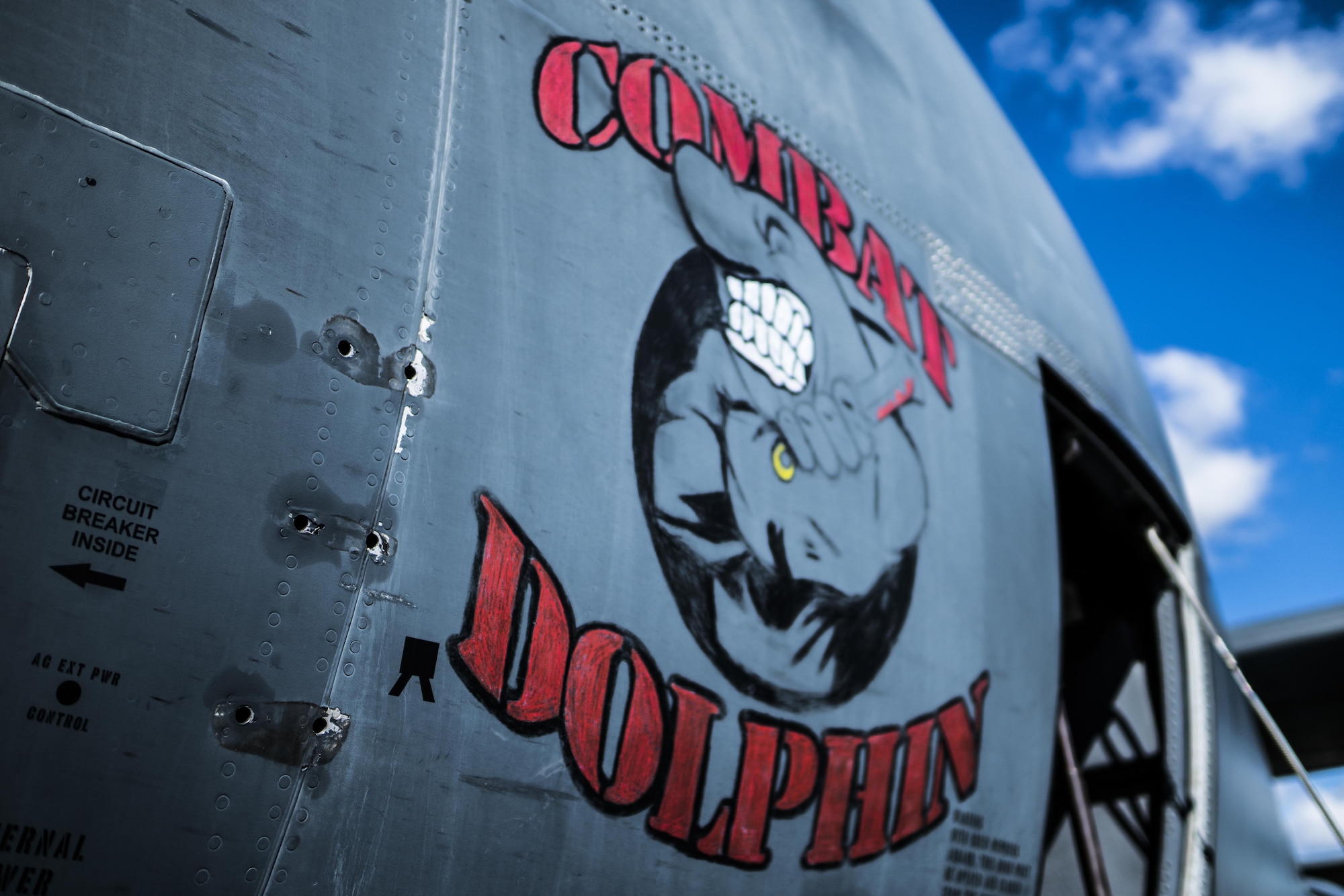 A No. 37 Squadron Royal Australian Air Force aircrew and observers from the U.S. Air Force 353rd Special Operations Group prepare to board the RAAF C-130J Hercules prior to a bilateral interfly with a U.S. Air Force 17th Special Operations Squadron MC-130J Commando II July 19, 2017, at Rockhampton, Australia. The bilateral training events performed during Talisman Saber 2017 enable greater interoperability between the U.S. and Australian militaries. (U.S. Air Force photo by Capt. Jessica Tait)