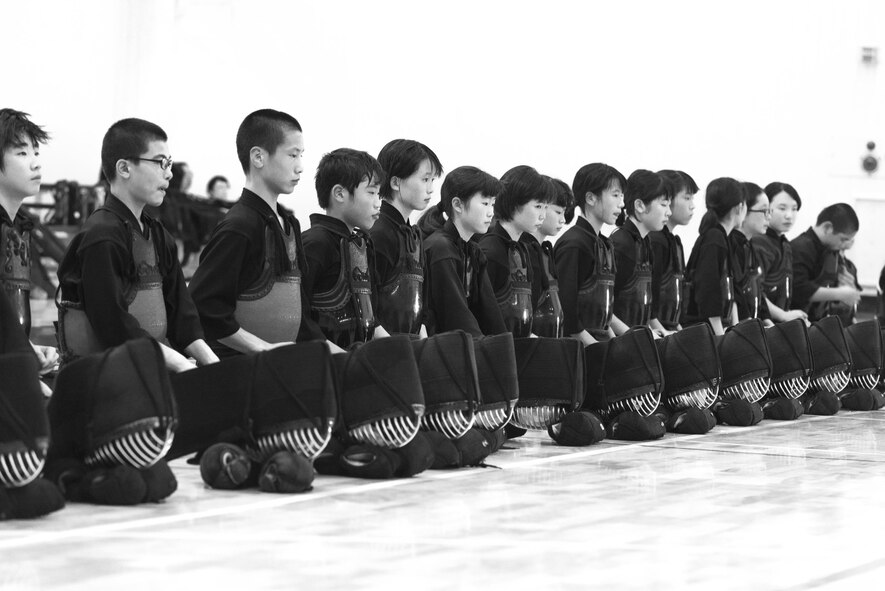 Students sit in seiza (kneeling position) at the end of the class during the Kendo Club Joint Summer Camp at Yokota Air Base, Japan, July 29, 2017.