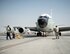 U.S Air Force Airmen with the 763rd Expeditionary Aircraft Maintenance Unit, prepare to place chocks for RC-135V/W Rivet Joint at Al Udeid Air Base, Qatar, July 27, 2017.  The Airmen are responsible for keeping the RC-135V/W Rivet Joint operational so it can provide near real time on-scene intelligence collection and analysis throughout the U.S. Air Forces Central Command area of responsibility. (U.S. Air Force photo by Tech. Sgt. Amy M. Lovgren