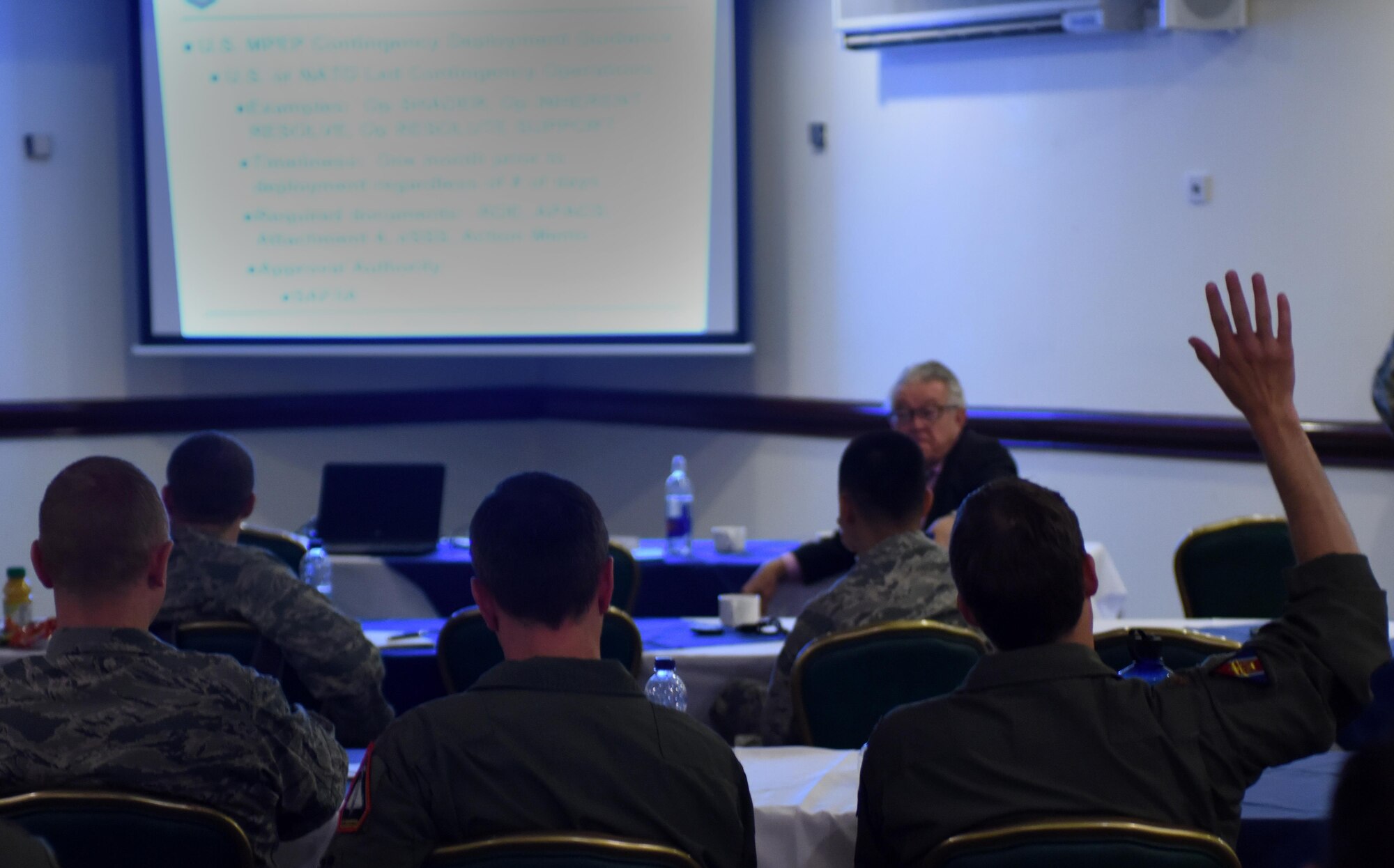 U.S. Airmen participate in the Military Personnel Exchange Program forum at Royal Air Force Lakenheath, England, July 27. The MPEP currently has more than 130 Airmen are working in 22 countries and is advancing partner capabilities and interoperability.  (U.S. Air Force photo/Airman 1st Class Eli Chevalier)