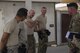 Command Sgt. Maj. William F. Thetford meets with 380th Expeditionary Security Forces Squadron Airmen July 26, 2017, at Al Dhafra Air Base, United Arab Emirates. During the visit, Thetford encouraged Airmen to tell their best “So there I was…” stories about their most interesting deployment experiences. (U.S. Air Force photo by Senior Airman Preston Webb)