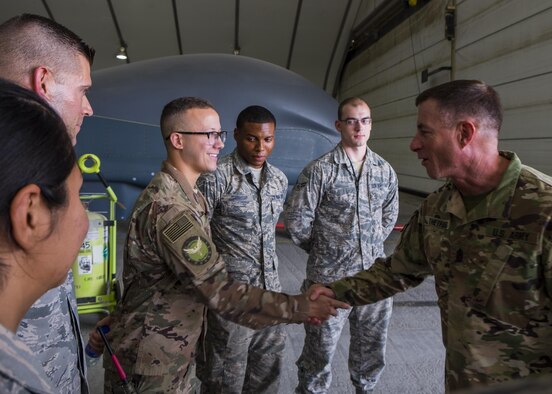 Command Sgt. Maj. William F. Thetford meets with 380th Air Expeditionary Wing Airmen July 26, 2017, at Al Dhafra Air Base, United Arab Emirates.