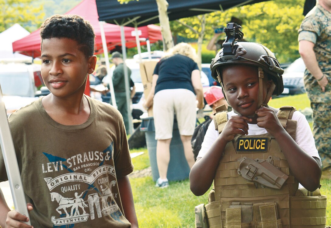 The Provost Marshal's Office brought some of their tactical gear for members of the community to try on for size and by the looks of it, this kid might have found the right fit.