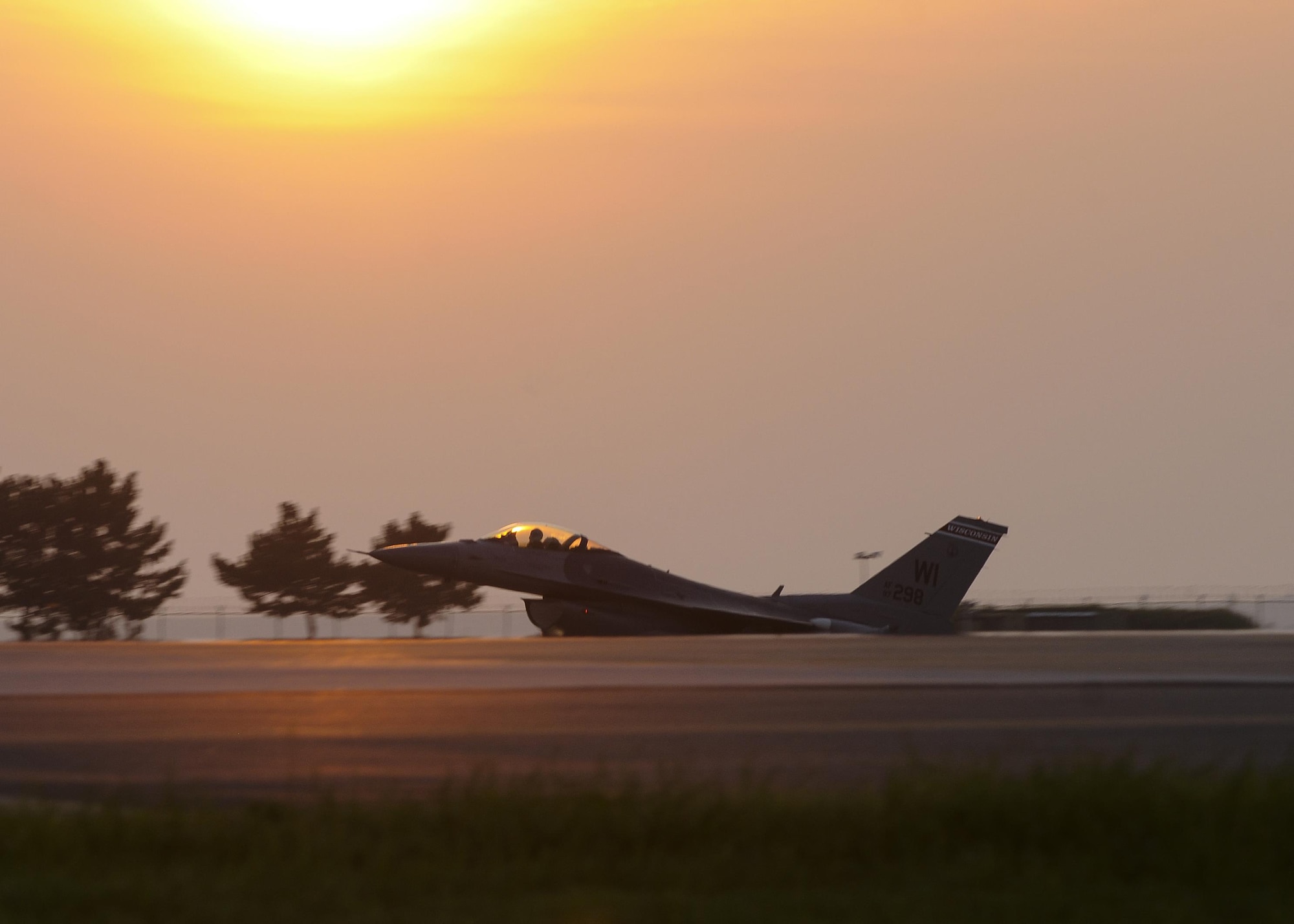 An F-16 Fighting Falcon, or more commonly a Viper, assigned to the 176th Fighter Squadron, 115th Fighter Wing, Wisconsin Air National Guard lands at Kunsan Air Base, Republic of Korea, Aug. 8, 2017.