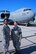 Staff Sgt. Anisa Thomas, from the Health Service Management career field, and currently the 932nd Aeromedical Evacuation Squadron Ground Training Noncommissioned Officer in Charge, smiles with Staff Sgt. Deanne Wagner as they prepare to help escort 