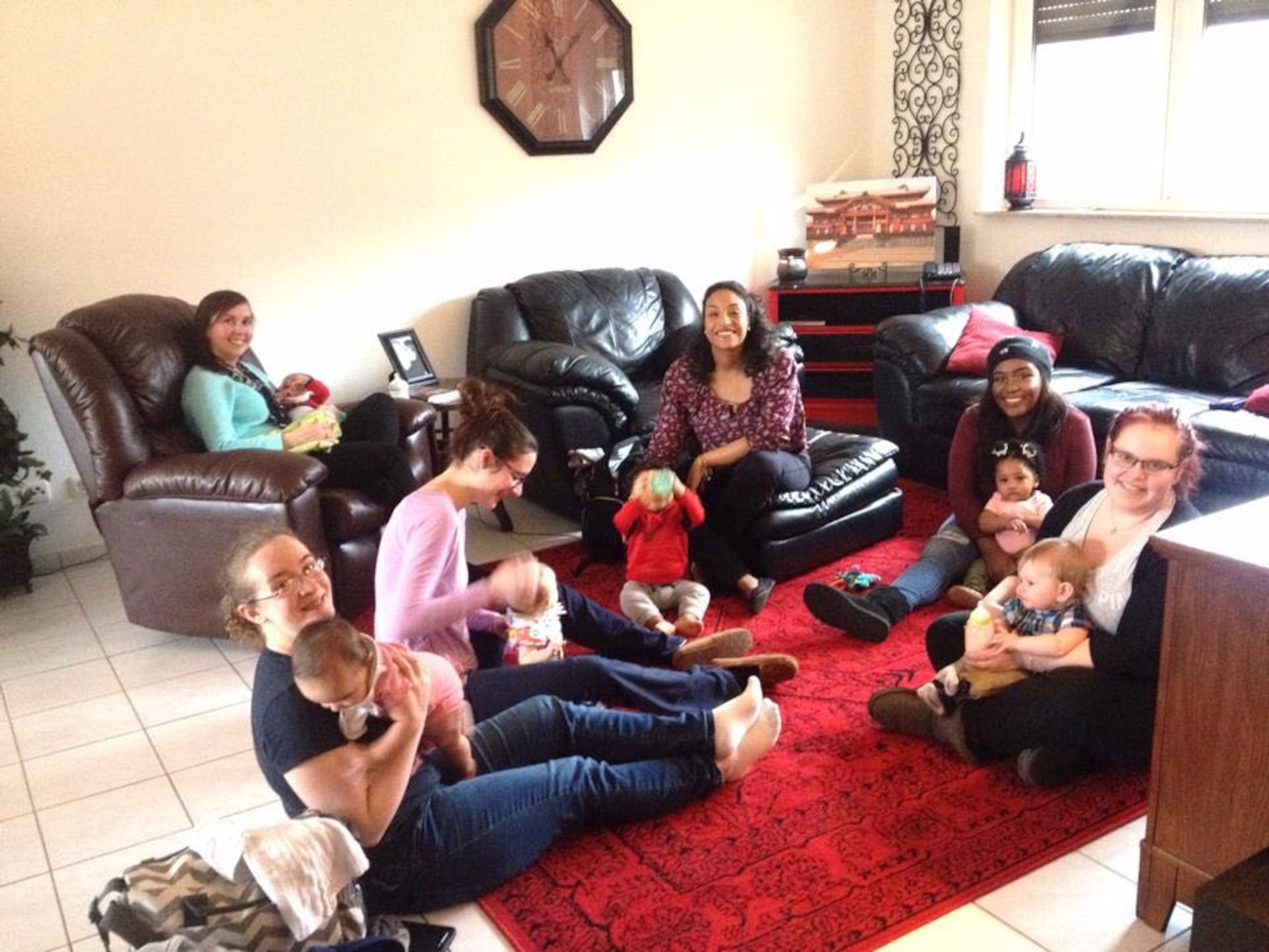 Spouses of the 721st Aircraft Maintenance Squadron attend a New Parent Support Group meeting.