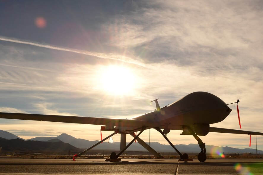 An MQ-1 Predator sits on the flight line Dec. 8, 2016, at Creech Air Force Base, Nev. The predator started as an RQ-1 in the late 1990s providing reconnaissance capabilities only until the early 2000s when it was equipped with two AGM-114 Hellfire missiles. (U.S. Air Force photo/Senior Airman Christian Clausen)