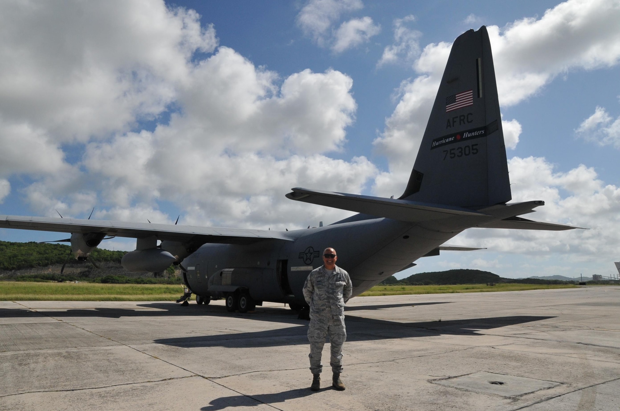 Chief Master Sgt. Vincent Armata, 403rd Aircraft Maintenance Squadron superintendent, poses for a photo in front of a WC-130J Super Hercules aircraft May 6, 2017 at St. Croix, U.S. Virgin Islands. (U.S. Air Force photo/Master Sgt. Jessica Kendziorek)