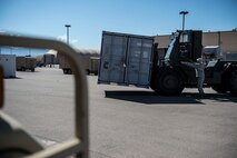 Chief Master Sgt. Robert Hughes, 635th Materiel Maintenance Group chief, guides a forklift of equipment at Holloman Air Force Base N.M., July 28, 2017, to be delivered by members of Army’s 424th Transportation Company to be used during Patriot Warrior at Fort McCoy, Wis. Patriot Warrior is a joint field training exercise that replicates all aspects of combat medical service support, and without the cargo provided by Holloman and the delivery made by the Army’s 424th Transportation Company Patriot Warrior could not happen. (U.S. Air Force photo by Senior Airman Chase Cannon)