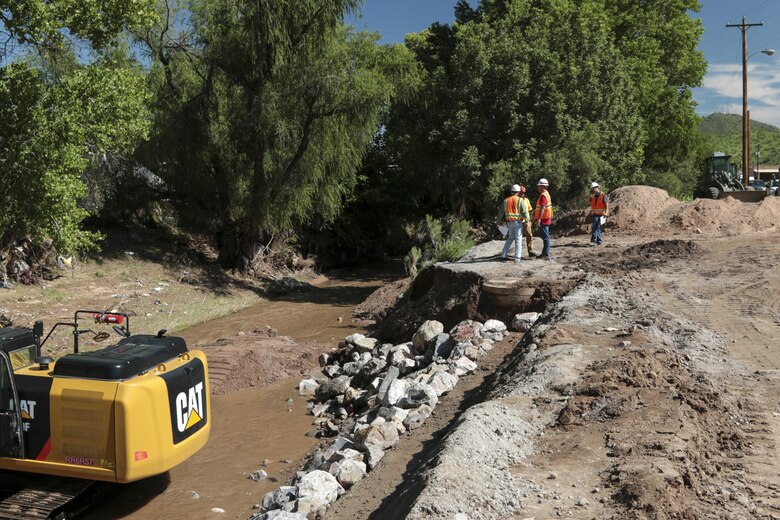 An imminent threat of unusual flooding must exist and a state must request Corps assistance.