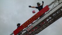 During the seventh annual STEM camp at Quantico Middle / High School, students developed  balloons filled with oatmeal, water, and red dye to simulate the brain, and had to develop a structure to protect the “balloon brains” from concussion.  The activity culminated in a competition where students dropped their balloon brains from the ladder of a fire truck supplied by the Quantico Fire Department. Three balloon brains tied for honors, surviving drops up to 21 feet. (Courtesy photo)