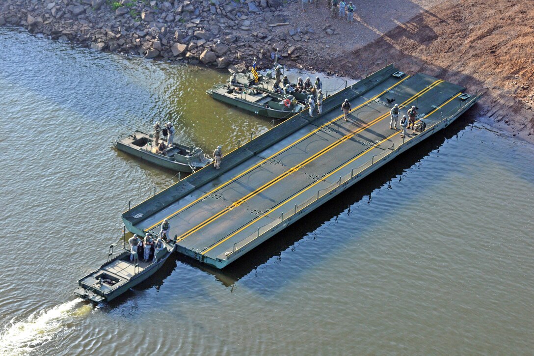 Troops Constructing Improved Ribbon Bridge