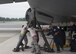 Team Dover maintainers connect an aircraft jack to a C-5M Super Galaxy during a nose landing gear maintenance operations check July 28, 2017, at Dover Air Force Base, Del. The maintainers were a total force team, comprised of active duty, Reserve and civilian Airmen. (U.S. Air Force photo by Senior Airman Zachary Cacicia)