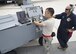 Master Sgt. Duane Lewis, 512th Maintenance Squadron aero repair craftsman, right, and Staff Sgt. Andrew Kim, 436th MXS aerospace maintenance journeyman, operate a hydraulic pumping unit to jack-up a C-5M Super Galaxy undergoing an operations check July 28, 2017, at Dover Air Force Base, Del. The C-5M’s nose end was jacked up several inches so that the landing gear could fully extend and retract. (U.S. Air Force photo by Senior Airman Zachary Cacicia)