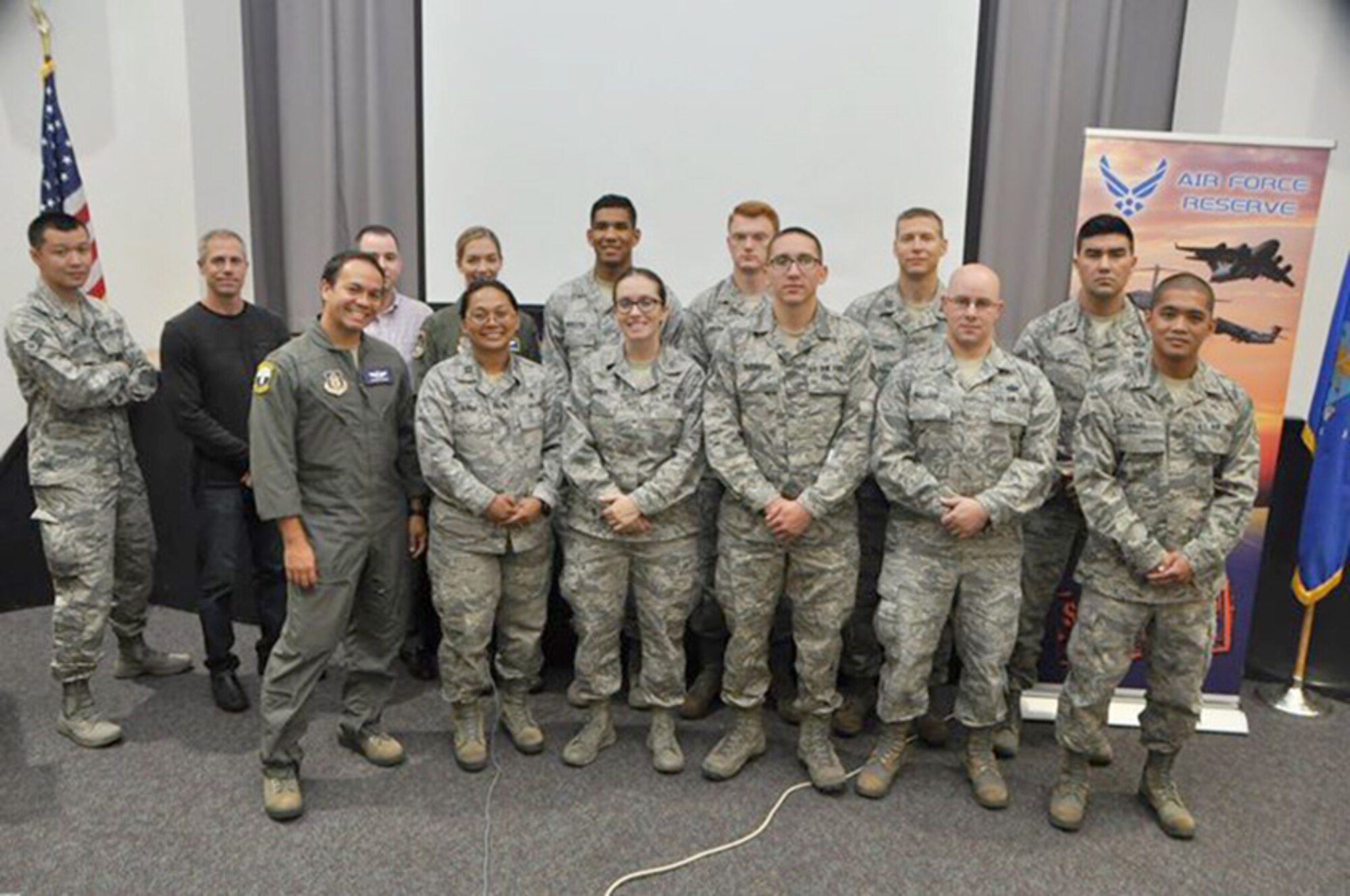 The 349th Air Mobility Wing's newest Citizen Airmen pose for a photo during newcomer's inprocessing July 22, 2017, at Travis Air Force Base, Calif. (U.S. Air Force photo by Senior Master Sgt. Rachel Martinez)