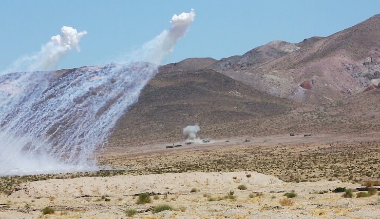 A U.S. Marine antitank missileman with Combined Anti-Armor Team, 1st Battalion, 1st Marine Regiment, Marine Air Ground Task Force-8 (MAGTF-8) fires a BMG-71E inert TOW missile at a target for a Tank Mechanized Assault Course (TMAC) during Integrated Training Exercise (ITX) 5-17 at Marine Corps Air Ground Combat Center, Twentynine Palms, Calif., July 28, 2017. The purpose of ITX is to create a challenging, realistic training environment that produces combat-ready forces capable of operating as an integrated MAGTF. (U.S. Marine Corps Photo by Sgt. Kassie L. McDole)