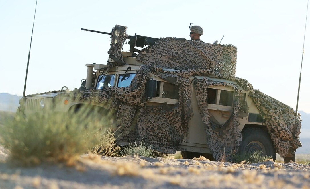 U.S. Marines with Combined Anti-Armor Team (CAAT), 1st Battalion, 1st Marine Regiment, Marine Air Ground Task Force-8 (MAGTF-8) provide security while conducting a Tank Mechanized Assault Course (TMAC) during Integrated Training Exercise (ITX) 5-17 at Marine Corps Air Ground Combat Center, Twentynine Palms, Calif., July 28, 2017. The purpose of ITX is to create a challenging, realistic training environment that produces combat-ready forces capable of operating as an integrated MAGTF. (U.S. Marine Corps Photo by Sgt. Kassie L. McDole)