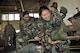 Senior Airman Emily Campos, 302nd Operations Group, assists Staff Sgt. Sueann Carrasco, 302nd Maintenance Group, as she and other 302nd Airlift Wing reservists practice donning chemical warfare gear during pre-deployment training at Peterson Air Force Base, Colo., July 16, 2017. More than 150 Air Force reservists took the training, which included how to respond to an active shooter, use of the chemical warfare mission oriented protective posture, and an overview of self-aid buddy care in a combat environment. (U.S. Air Force photo/1st Lt. Stephen J. Collier)