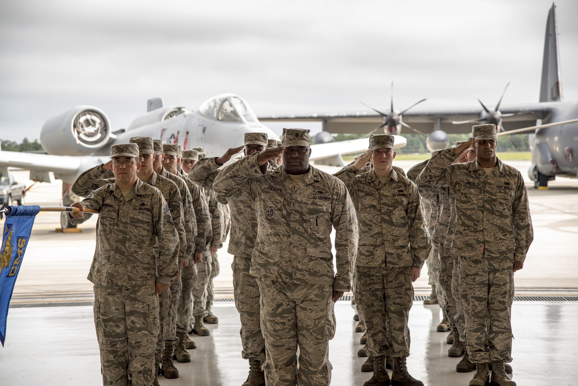 Airmen from the 23d Maintenance Group render salutes during the National Anthem as part of an assumption of command ceremony, Aug. 3, 2017, at Moody Air Force Base, Ga. Col. John Chastain, former 332d Maintenance Group commander, 332d Air Expeditionary Wing, Southwest Asia, assumes command of the group that provides maintenance and repair for Moody’s A-10C Thunderbolt IIs, HC-130J Combat King IIs and HH-60G Pave Hawks.(U.S. Air Force photo by Airman Eugene Oliver)