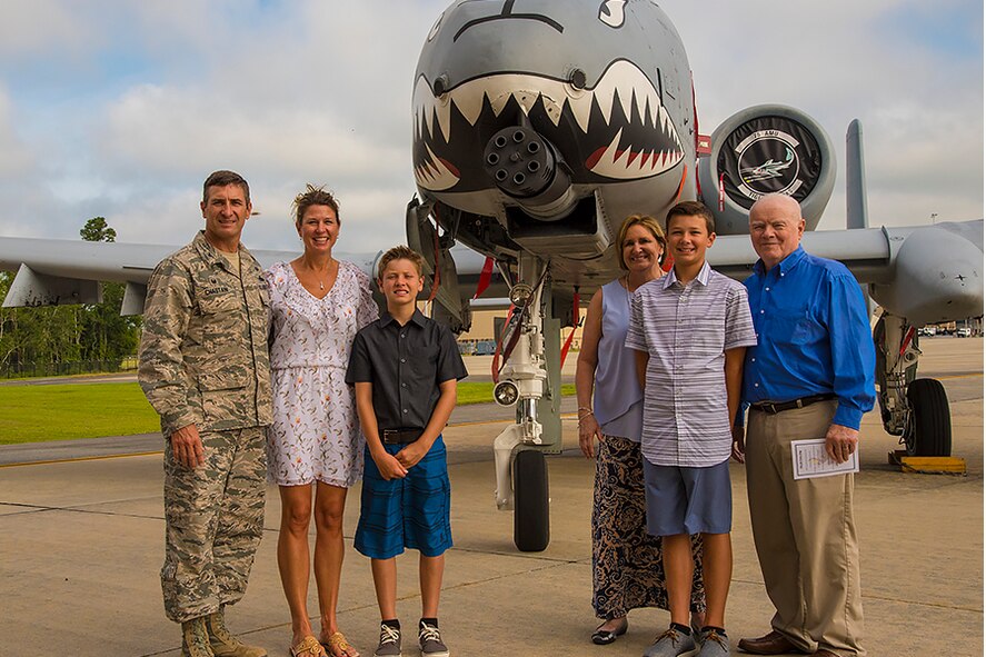 Col. John Chastain, 23d Maintenance Group Commander, and family stand in front of an A-10C Thunderbolt II after an assumption of command ceremony, Aug. 3, 2017, at Moody Air Force Base, Ga. After officially assuming command, Chastain expressed his gratitude in becoming a part of the historical Flying Tigers and looks forward to leading the 23d MXG Airmen. (U.S. Air Force photo by Airman Eugene Oliver)