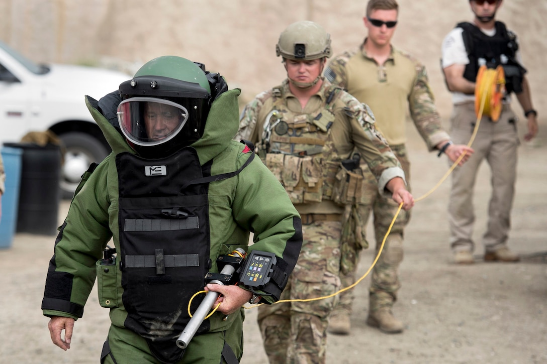 A combined military and police explosive ordnance disposal team