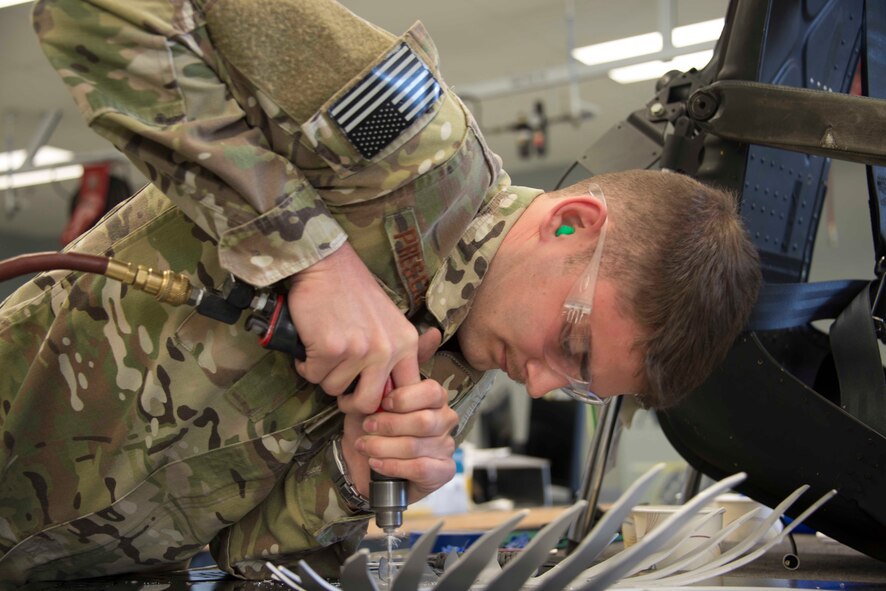 Senior Airman Spencer Prescott, 919th Special Operations Maintenance Squadron structural journeyman, works on a sheet metal project