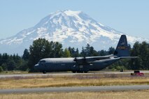 A U.S. Air Force C-130 Hercules with the 19th Airlift Wing, Little Rock Air Force Base, Ark., lands at Joint Base Lewis-McChord, Wash., July 31, 2017. More than 3,000 Airmen, Soldiers, Sailors, Marines and international partners converged on the state of Washington in support of Mobility Guardian. The exercise is intended to test the abilities of the Mobility Air Forces to execute rapid global mobility missions in dynamic, contested environments. Mobility Guardian is Air Mobility Command's premier exercise, providing an opportunity for the Mobility Air Forces to train with joint and international partners in airlift, air refueling, aeromedical evacuation and mobility support. (U.S. Air Force photo by Senior Airman Christopher Dyer)
