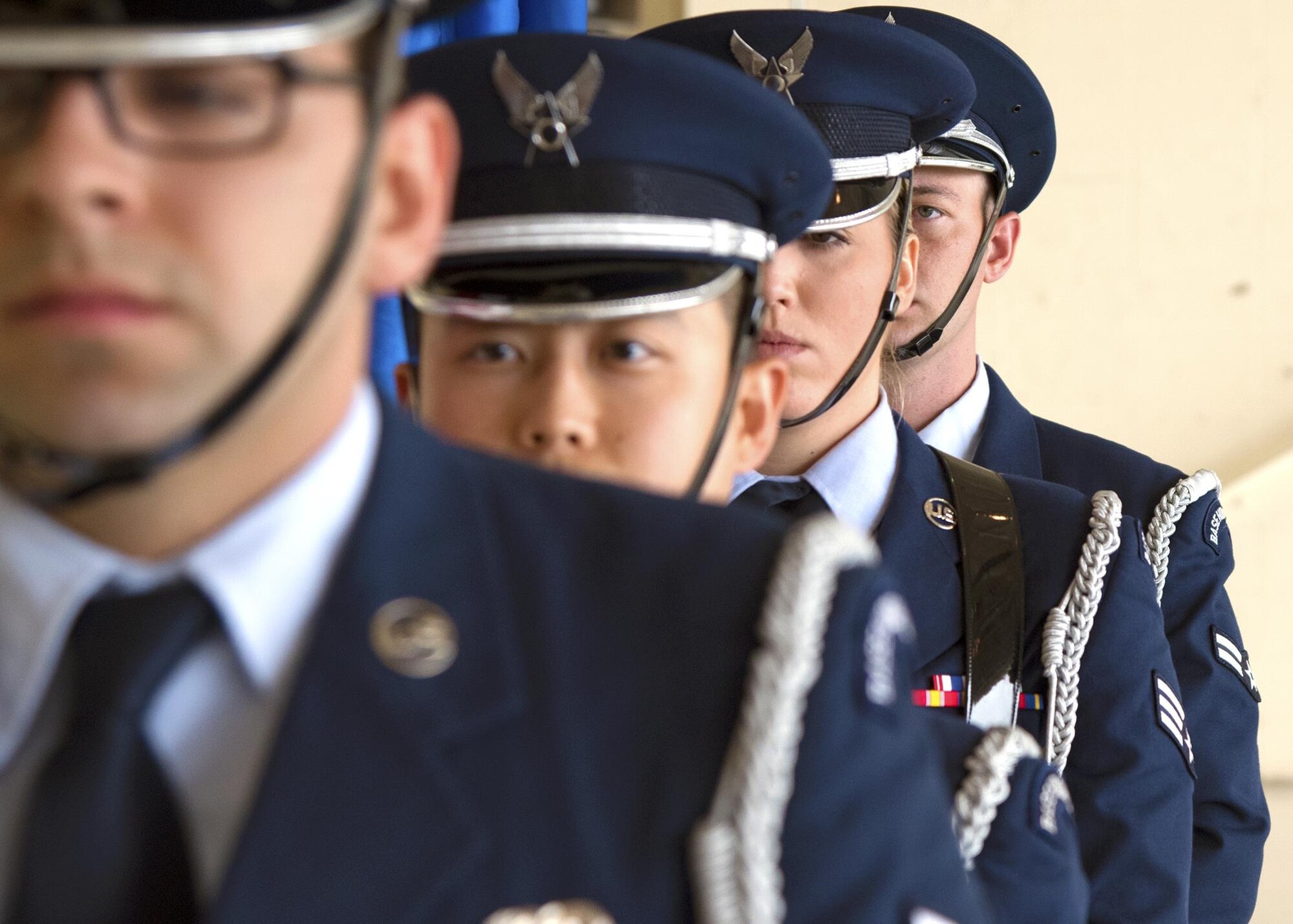 Moody Honor Guardsmen stand in formation during an assumption of command ceremony, Aug. 3, 2017, at Moody Air Force Base, Ga. An assumption of command is a military tradition that represents a formal assumption of a unit’s authority and responsibility by a commander. (U.S. Air Force photo by Airman Eugene Oliver)