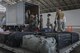 Airmen assigned to the 374th Logistics Readiness Squadron load cargo on a pallet, July 28, 2017, at Yokota Air Base, Japan. The 374 LRS processed cargo and Airmen assigned to the 172nd Airlift Wing, Jackson Air National Guard, Mississippi. (U.S. Air Force photo by Airman 1st Class Juan Torres)
