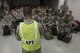 An Airmen assigned to the 374th Logistics Readiness Squadron briefs chalk one of Airmen assigned to the 172nd Airlift Wing, Jackson Air National Guard, Mississippi. A chalk is used to refer to either passengers or equipment loaded as cargo. (U.S. Air Force photo by Airman 1st Class Juan Torres)