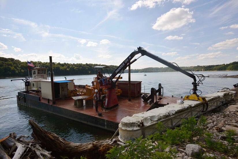 pride-of-the-cumberland-back-in-stride-clearing-debris-trash-on-lake