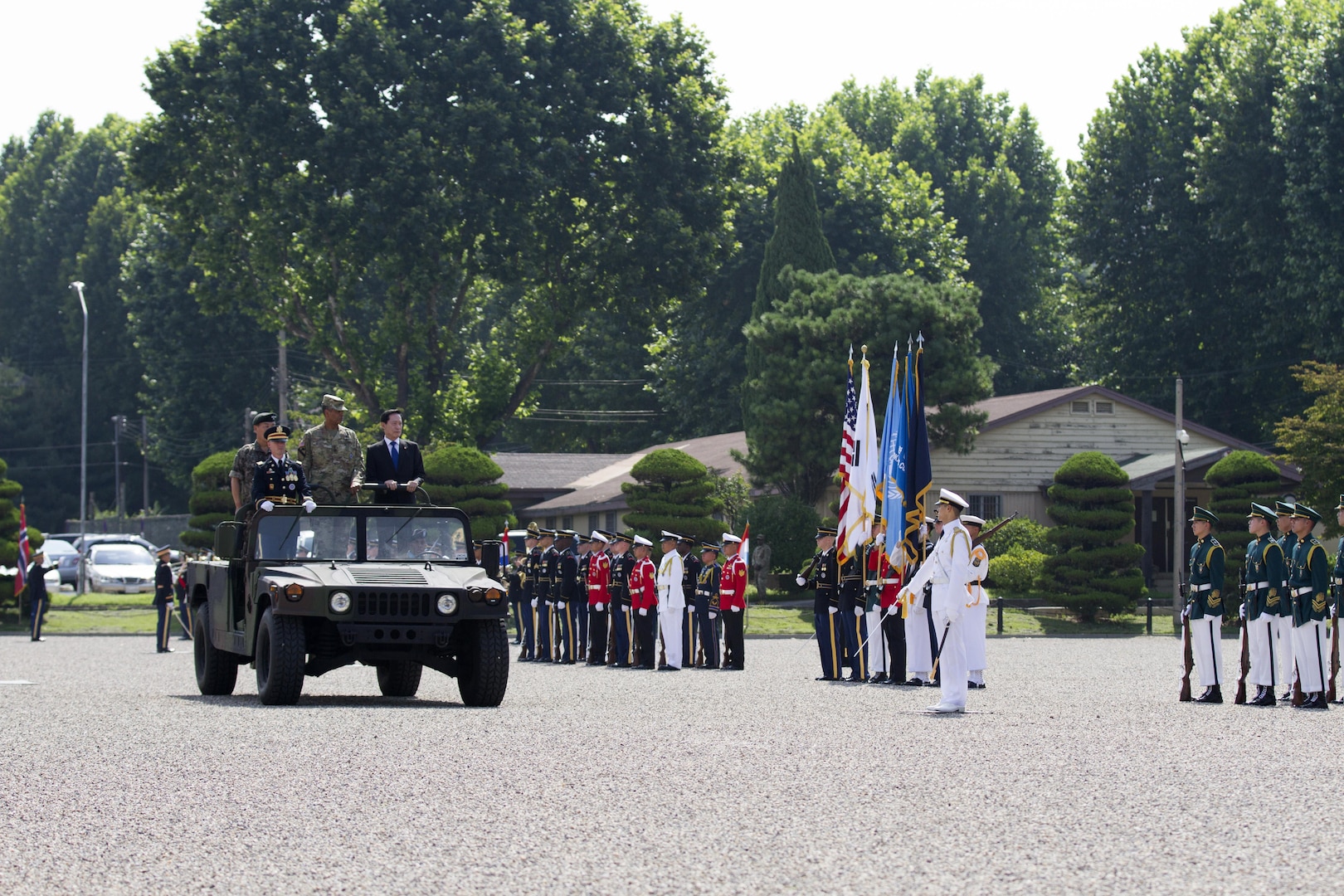 General Vincent K. Brooks, commander of United Nations Command, Combined Forces Command and United States Forces Korea, hosts a ceremony honoring the new Republic of Korea Minister of National Defense Song, Young-moo at U.S. Army Garrison Yongsan, Republic of Korea, Aug. 4. The visit was the Honorable Song’s first time to U.S. Forces Korea headquarters since taking over as the MINDEF July 14. The ceremony included an inspection of the troops, a 19-gun salute and a presentation of one of the shell casings to honor the MINDEF.