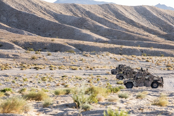 U.S. Marines with Combined Anti-Armor Team (CAAT), 1st Battalion, 1st Marine Regiment, Marine Air Ground Task Force-8 (MAGTF-8) pre-stage HUMVEEs before a Tank Mechanized Assault Course (TMAC) during Integrated Training Exercise (ITX) 5-17 at Marine Corps Air Ground Combat Center, Twentynine Palms, Calif., July 28, 2017. The purpose of ITX is to create a challenging, realistic training environment that produces combat-ready forces capable of operating as an integrated MAGTF. (U.S. Marine Corps Photo by Sgt. Kassie L. McDole)