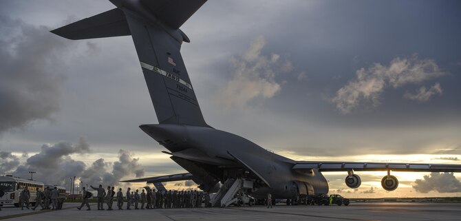 A U.S. Air Force C-5M Super Galaxy assigned to the 22nd Airlift Squadron, Travis Air Force Base (AFB), Calif., arrives at Andersen AFB, Guam July 24, 2017. The C-5 transported equipment and personnel assigned to 37th Expeditionary Bomb Squadron, deployed from Ellsworth AFB, S.D. The 37th EBS replaces the 9th EBS from Dyess AFB, Texas, which is currently supporting U.S. Pacific Command’s Continuous Bomber Presence mission. (U.S. Air Force photo/Tech. Sgt. Richard P. Ebensberger)