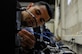 Senior Airman Eric Contreras, 86th Communications Squadron systems acquisitions technician, connects wires to new computers for imaging on Ramstein Air Base, Germany, Aug. 3, 2017. The National Security Agency has directed all of the Department of Defense to make the transition to Microsoft Windows 10. The NSA directive puts all branches of the military on the same operating system for the first time ever. (U.S. Air Force photo by Airman 1st Class Savannah L. Waters)