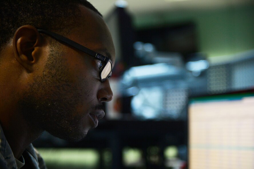 U.S. Air Force Airman 1st Class Jackson Dollar, 86th Airlift Wing Command Post junior controller, tests the Giant Voice public announcement system on Ramstein Air Base, Germany, Aug. 2, 2017. Command post is responsible for sending emergency notifications to units, managing the emergency mass notification system, and providing command and control support to operations coming in and out of Ramstein. (U.S. Air Force photo by Airman 1st Class Joshua Magbanua)