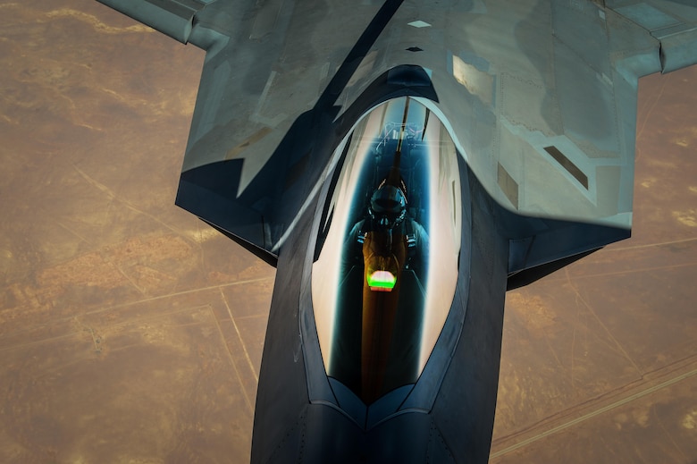 A F-22 Raptor receives fuel from a KC-135 Stratotanker during a mission in support of Operation Inherent Resolve July 31, 2017. The F-22 is a component of the Global Strike Task Force, supporting U.S. and Coalition forces working to liberate territory and people under the control of the Islamic State in Iraq and Syria. (U.S. Air Force photo/Staff Sgt. Michael Battles)