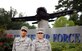 Staff Sgt. Luis Chiriboga, a 14th Civil Engineer Squadron engineering technician, and his wife, Airman 1st Class Estefania Briceno Ron, a personnel and administration technician assigned to the 14th Medical Support Squadron, stand at the entrance of Columbus Air Force Base, Miss. Chiriboga and Briceno Ron are both natives of Ecuador and received their U.S. citizenship after joining the Air Force. (U.S. Air Force photo/Staff Sgt. Chris Gross)