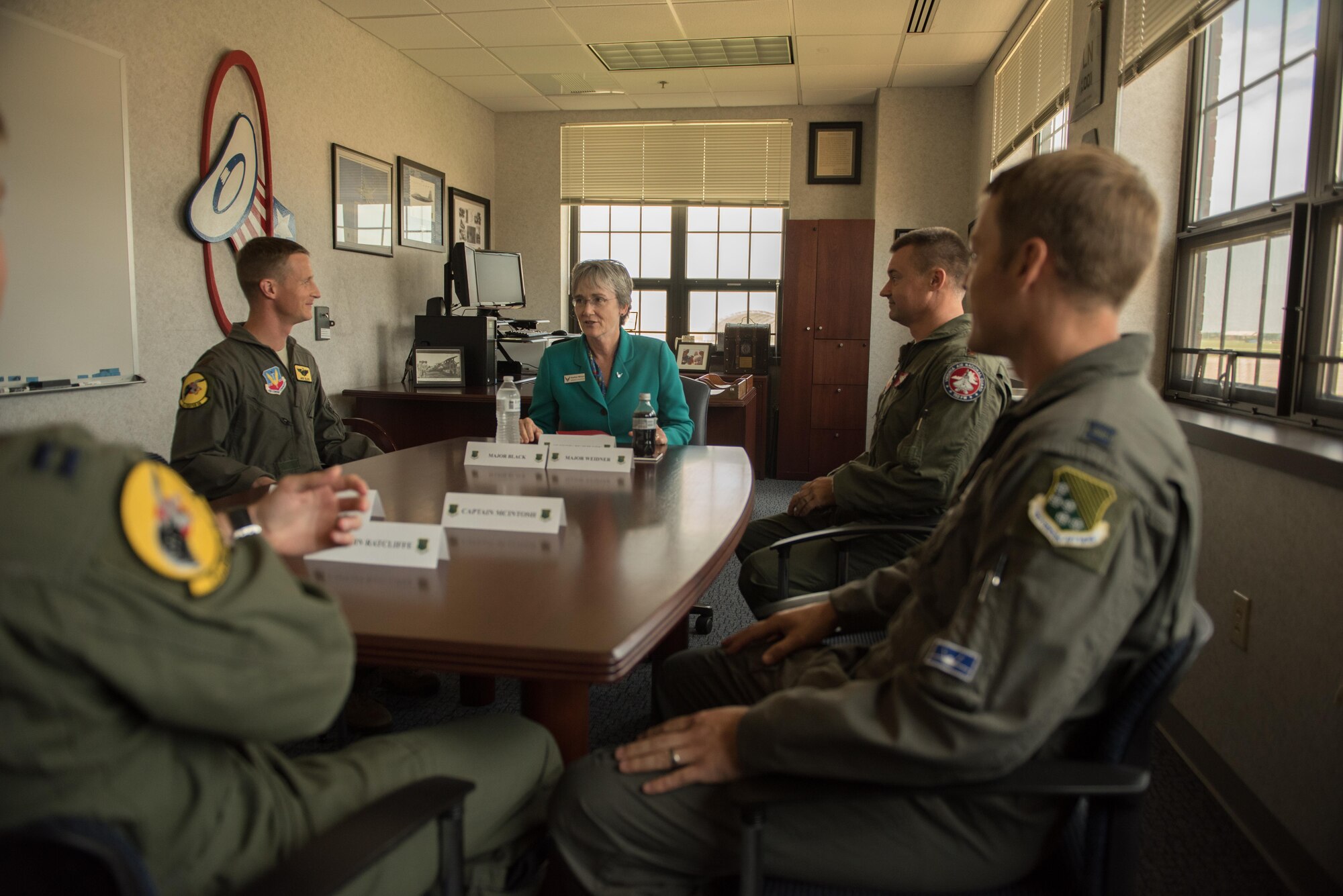 Photo of Air Force Secretary Heather Wilson meeting with 1st Fighter Wing pilots during her visit to Joint Base Langley-Eustis, Virginia.