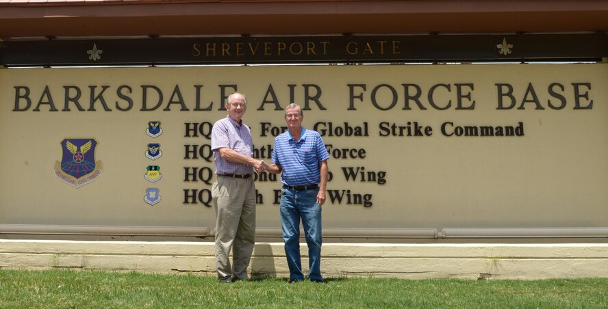 Forrest Carper, 2nd Force Support Squadron community readiness consultant, welcomes Larry Pierson to Barksdale Air Force Base, La., July 27, 2017.