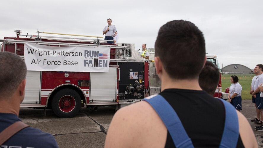 U.S. Air Force Col. Bradley McDonald, 88th Air Base Wing commander speaks to runners during the Run for the Fallen at Wright-Patterson Air Force Base, Ohio, September 9, 2016.  The Run for the Fallen provides an opportunity to remember and honor those who lost their lives and recognize those who continue to defend the nation. (U.S. Air Force photo/Michelle Gigante)