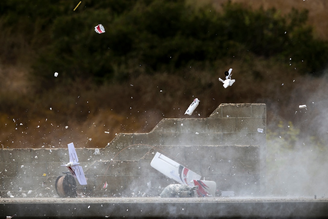 An explosion rips apart an unmanned aircraft during the Raven's Challenge EOD exercise at Camp Pendleton