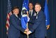 Assistant Vice Chief of Staff and Director, Air Staff, Lt. Gen. Stayce D. Harris, passes the guidon to Maj. Gen. John T. Rauch, Air Force Chief of Safety, during a change of command ceremony at Kirtland Air Force Base, New Mexico, Aug. 2, 2017. Rauch took command from Maj. Gen. Andrew M. Mueller who served as chief of safety and commander of the Air Force Safety Center since July 2015. (U.S. Air Force photo by Ken Moore)