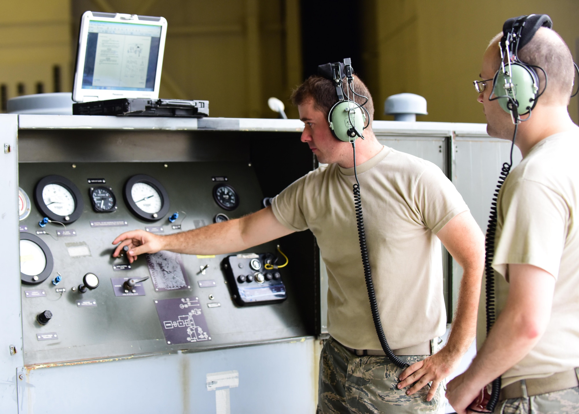 U.S. Air Force Tech. Sgt. Jeremy Garrow, left, an aircraft electrical and environmental system craftsman with the 509th Aircraft Maintenance Squadron (AMXS), and Staff Sgt. James Torrance, an aircraft electrical and environmental system craftsman with the 131st AMXS, monitor the cabin pressure during an annual test at Whiteman Air Force Base, Mo., July 27, 2017. These specialists are responsible for all the wiring and environmental control units on the aircraft.