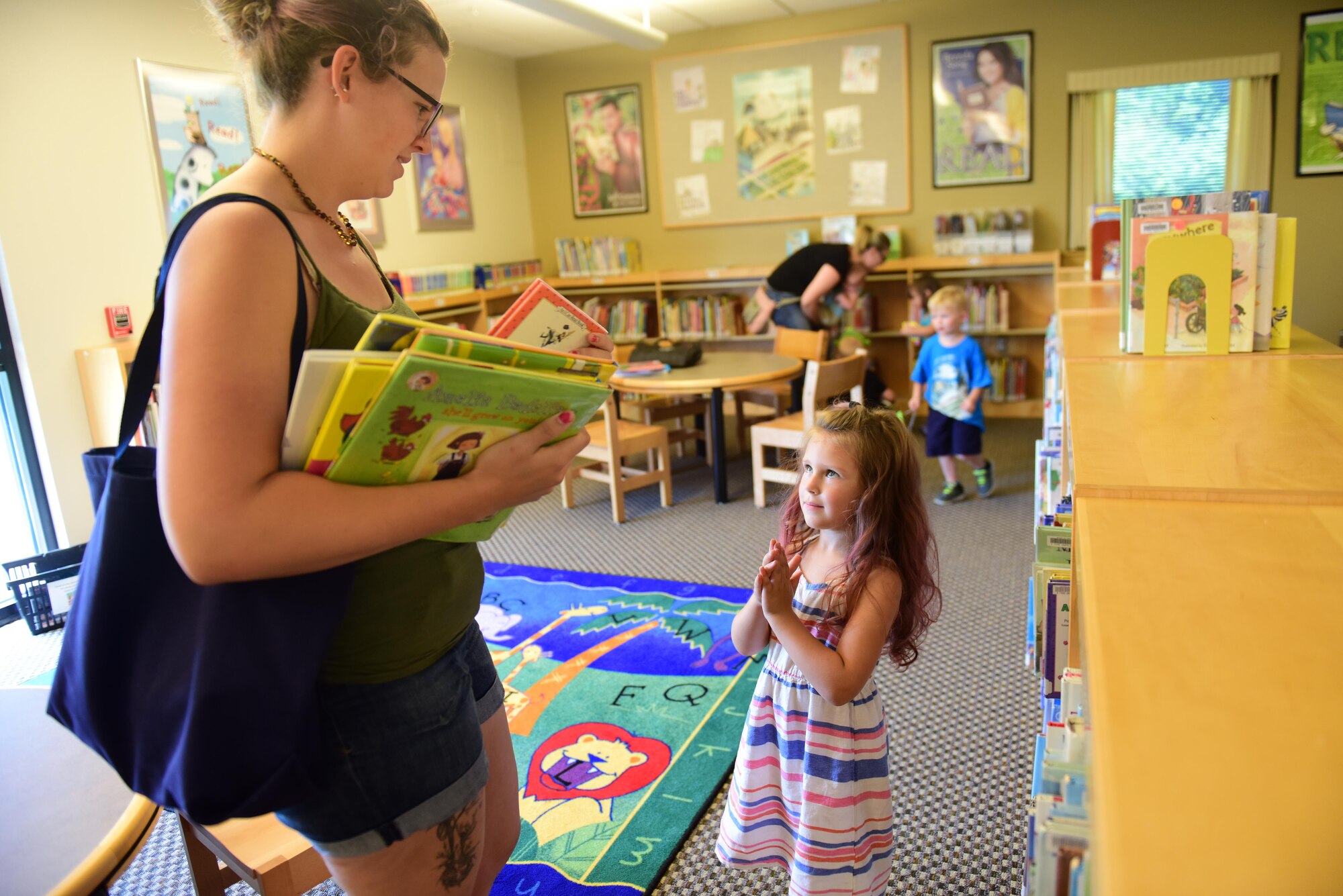 Members of Team Whiteman participate in the library's summer reading program at Whiteman Air Force Base, Mo., July 12, 2017. Around 300 children of all ages are involved in the three-month program. The program included self-paced reading, crafts, scavenger hunts and other fun activities.