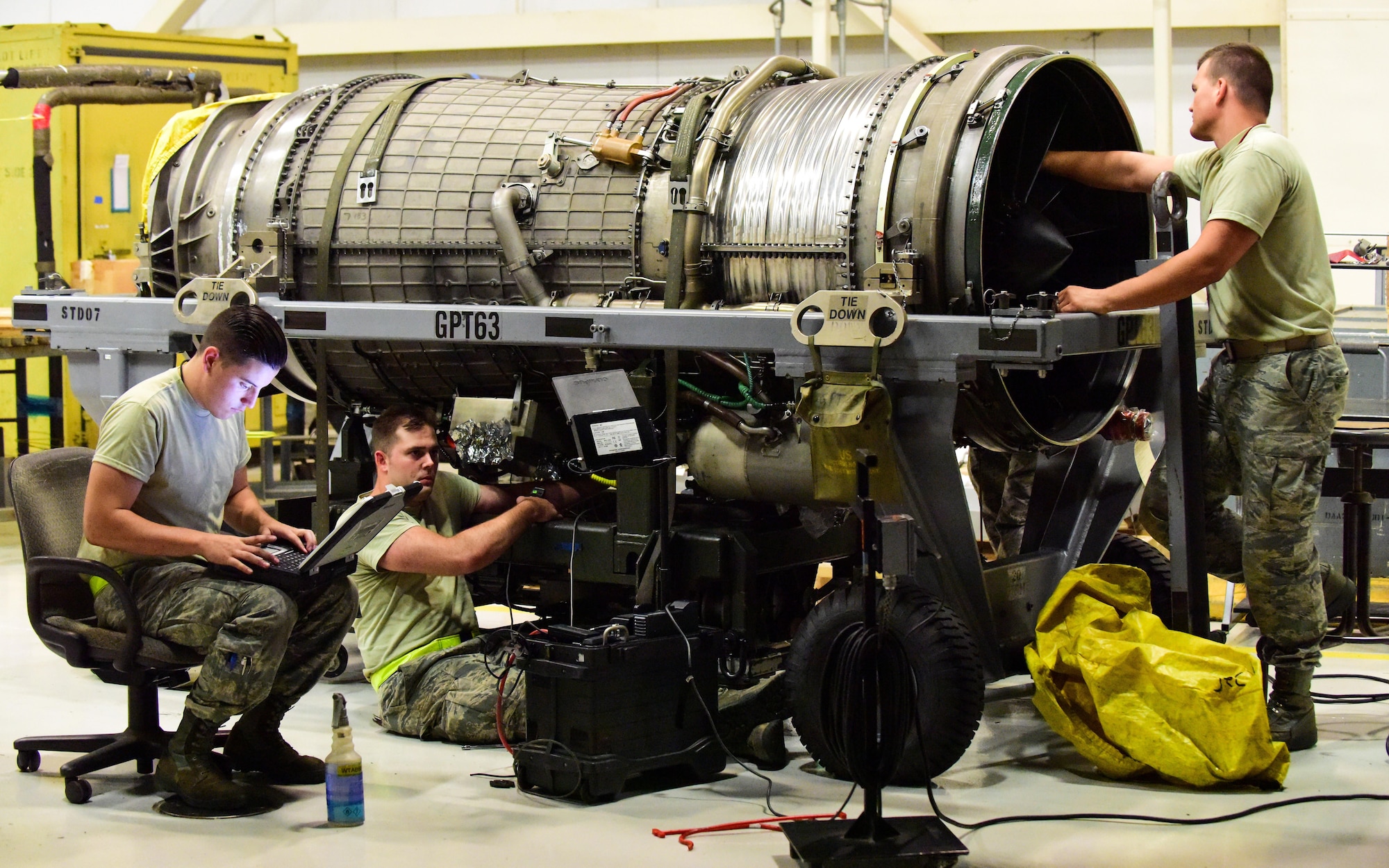 Aircraft propulsion system specialist with the 509th Aircraft Maintenance Squadron inspect the interior of a B-2 Spirit engine at Whiteman Air Force Base, Mo., July 27, 2017. The inspection was performed to determine the serviceability of the engine before it was installed into a B-2.