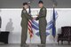 Col. Jennifer Short, 23d Wing commander, presents the Legion of Merit award to Col. Timothy Sumja, 23d Fighter Group outgoing commander, during a change of command ceremony, at Moody Air Force Base, Aug. 4, 2017. During his command, Sumja directed flying and support operations for the largest A-10C Thunderbolt II operational fighter group. (U.S. Air Force photo by Staff Sgt. Olivia Dominique)